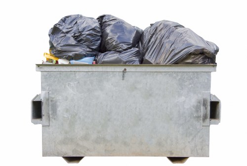 Business professionals discussing waste removal services in Chigwell